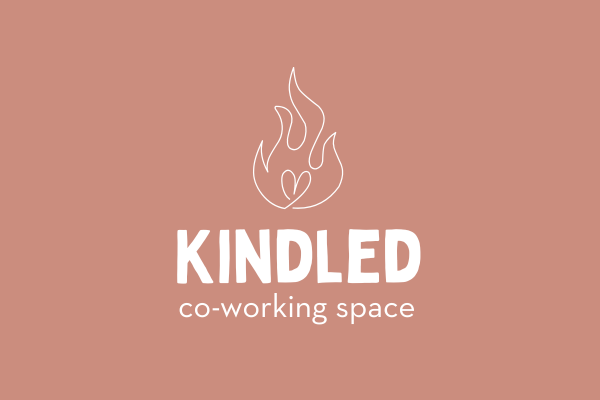 an outline of a flame with a heart in the middle on top of the words Kindled Co-working space